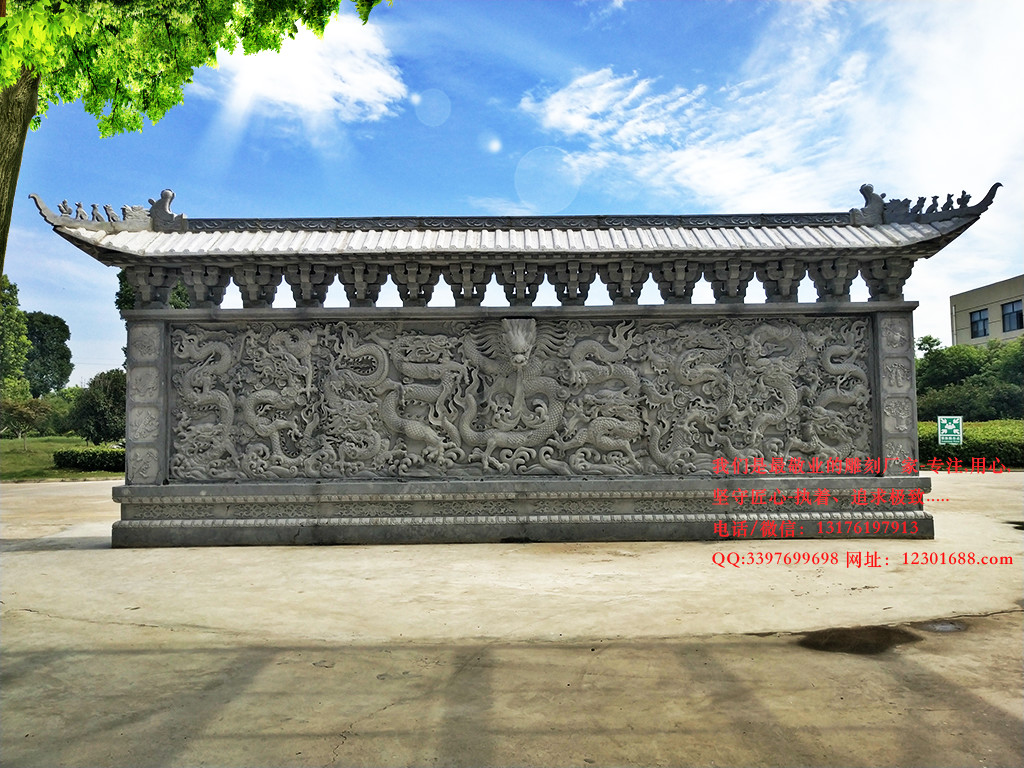 九龍壁浮雕壁畫代表威嚴(yán)和祥瑞的石雕藝術(shù)品
